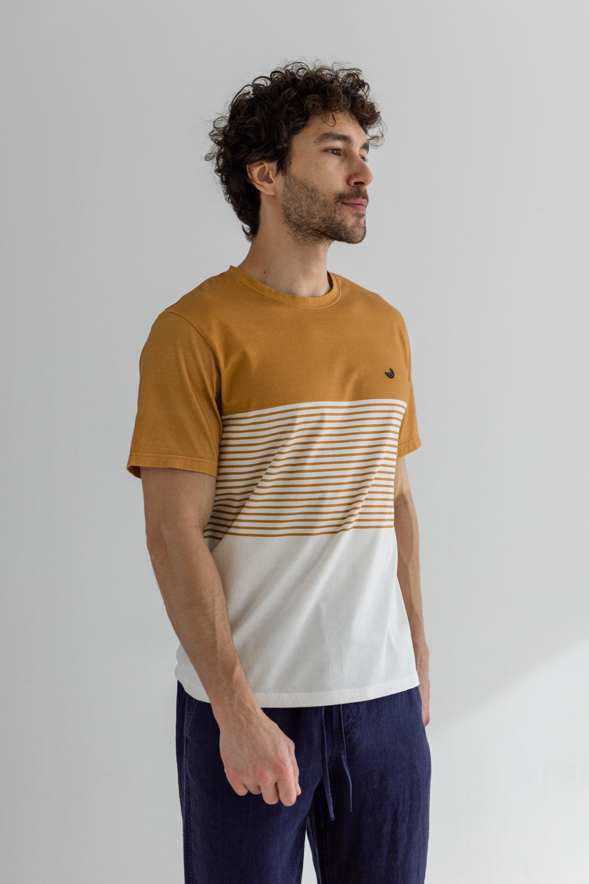 Mustard Colour-block t-shirt men navy pants wear view front