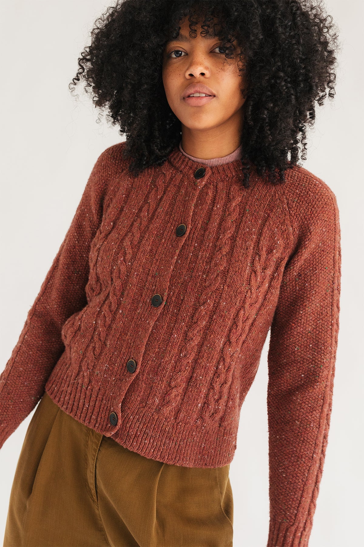 meta-hover, cropped ethical red cardigan