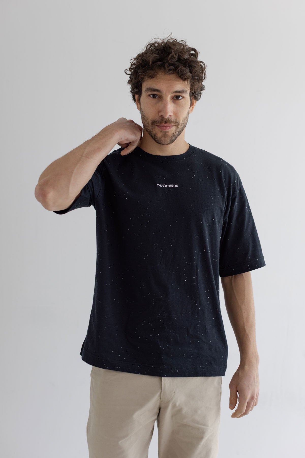 Black Oversized t-shirt men light pants wear view front