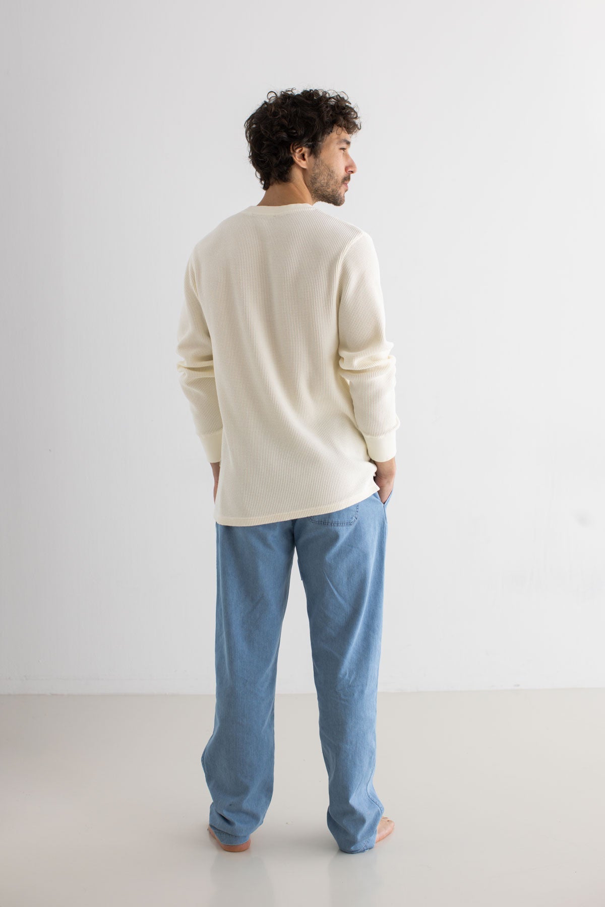Ecru waffle sweatshirt men blue pants full body view back